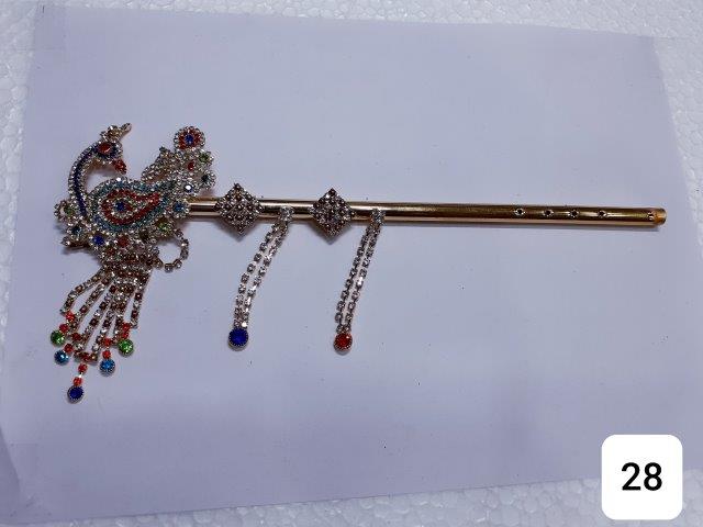 GOLDEN 10'' VERY BEAUTIFUL PEACOCK SHAPED WITH LATKAN AND FILL OF STONES BANSURI.