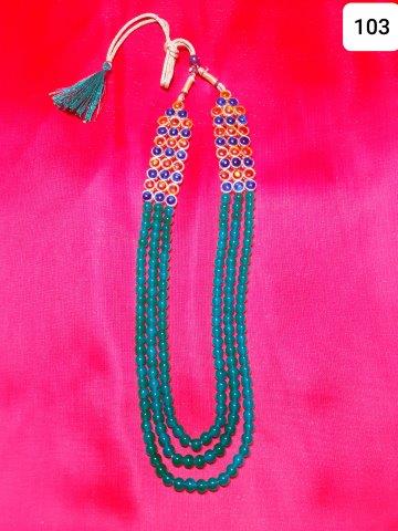 ROUND DESIGN MALA WITH FILL OF STONES.