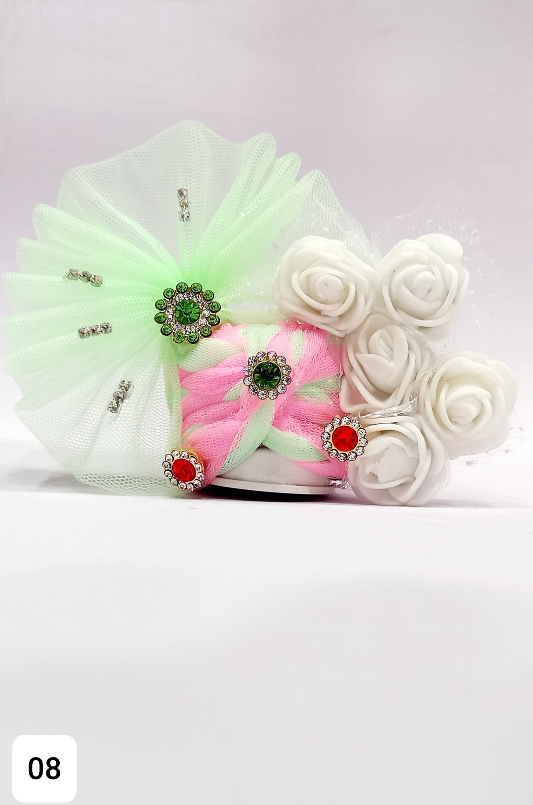 Decorated pagdi with stones and flowers